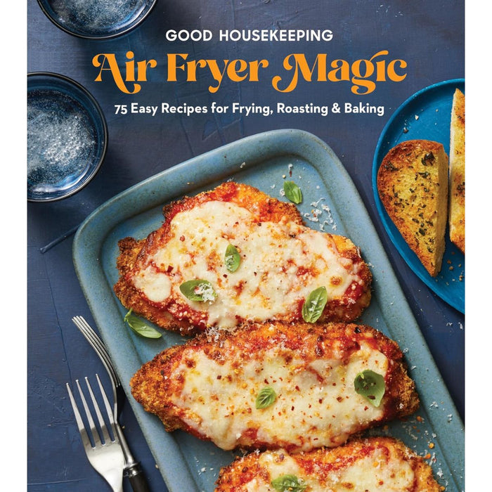 Cookbook cover of 'Good Housekeeping Air Fryer Magic' with air fried chicken on a blue tray.