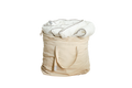 A beige fabric storage bag with handles, containing a white rolled-up quilt.