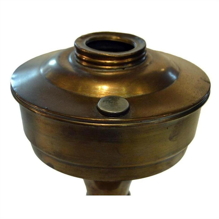 Close-up of antique brass oil lamp burner with screw cap and threaded opening, isolated on white background.
