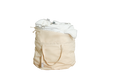Beige canvas laundry bag filled with white fabric, featuring handles and an external pocket.