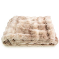 Beige faux fur blanket on a white background