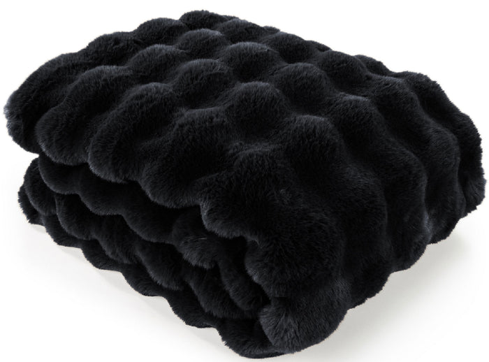 A folded black faux fur blanket with a wavy, tufted texture, shown on a clean white background.