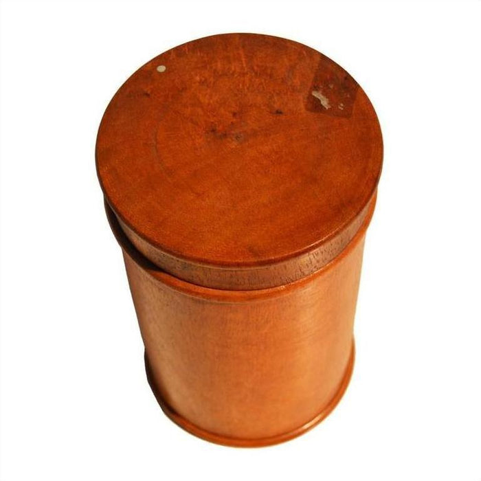 Brown wooden vintage Burmese canister with flat round lid on white background.
