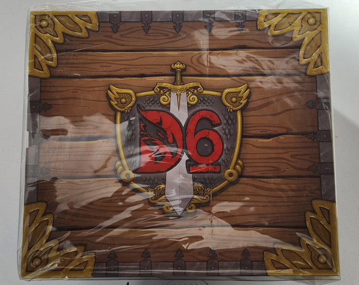 D6: Dungeons, Dudes, Dames, Danger, Dice and Dragons! game box featuring a shield design