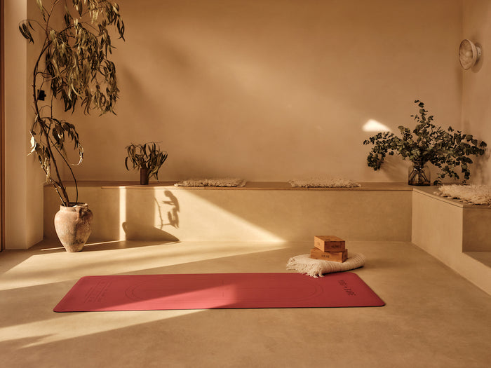 Desert Rose EverGrip Yoga Mat in empty room