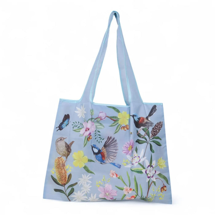 Light blue tote bag with floral and bird design on a white background