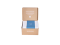 Open cardboard box with an inner package wrapped in white and blue paper. Text on the box lid and front is visible.