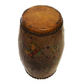 Close-up of antique hand painted Chinese drum with worn leather top and butterfly designs on wooden body.