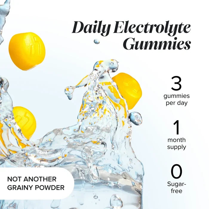 Yellow electrolyte gummies in a splash of water beside the heading 'Daily Electrolyte Gummies' with three gummies per day, one month supply and sugar-free, and a label reading 'not another grainy powder'.