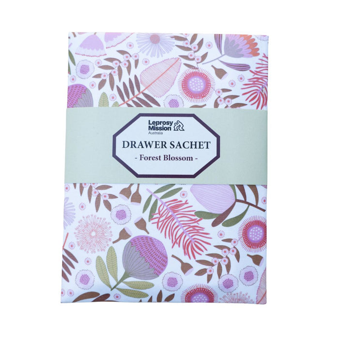 Drawer sachet with floral design and 'Leprosy Mission' branding on a white background