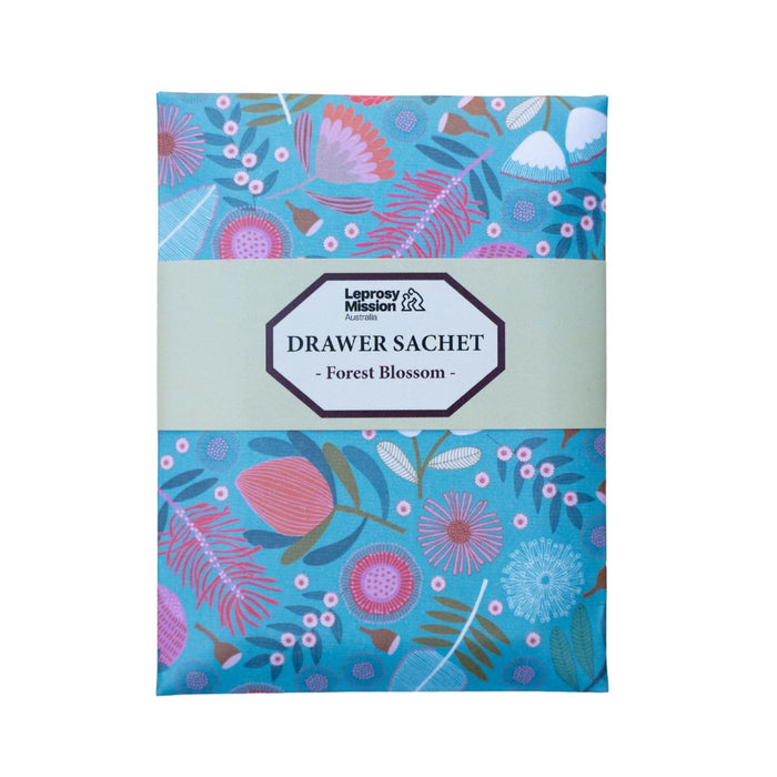 Drawer sachet with floral design and 'Leprosy Mission' branding on a white background