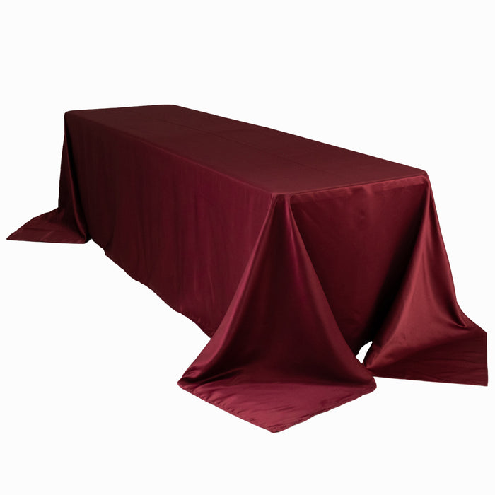 Burgundy tablecloth draping over a rectangular table
