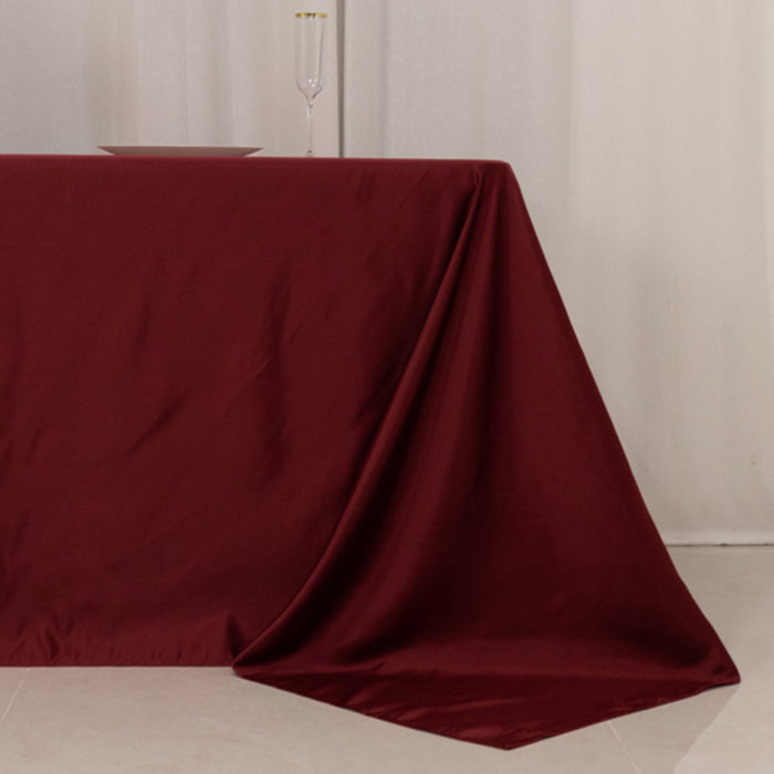 Burgundy tablecloth draped elegantly over a table