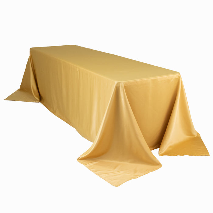 Yellow tablecloth draped elegantly over a rectangular table