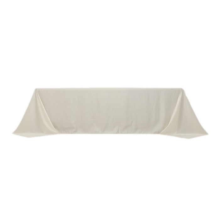 White tablecloth with elegant draping and smooth fabric texture