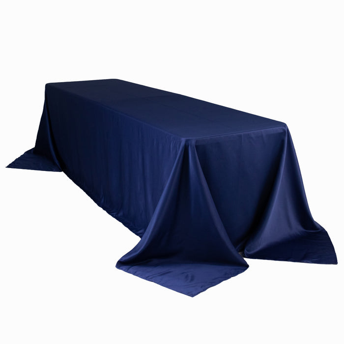Navy blue tablecloth draped on a rectangular table