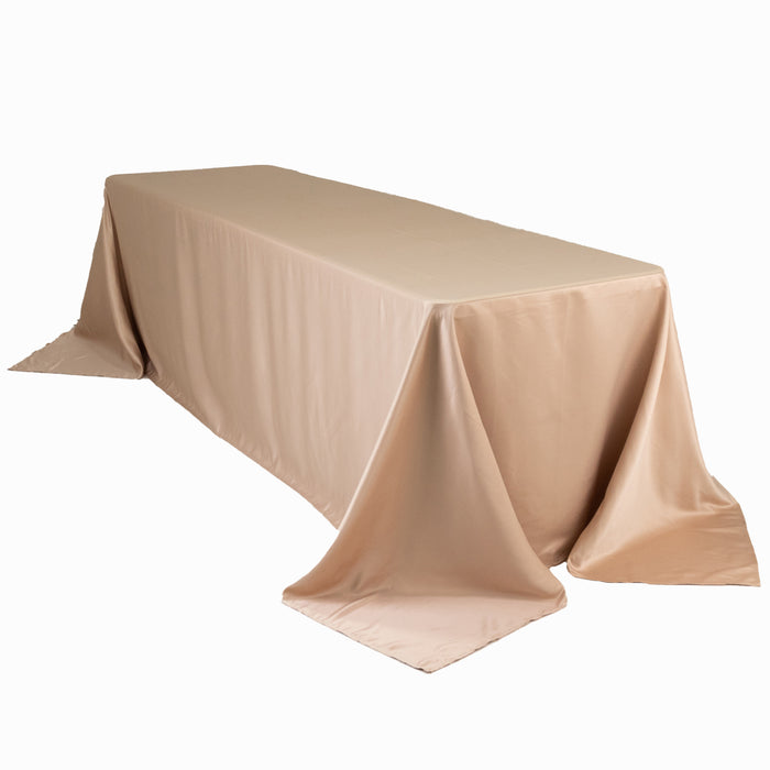 Beige rectangular tablecloth draped elegantly over a table