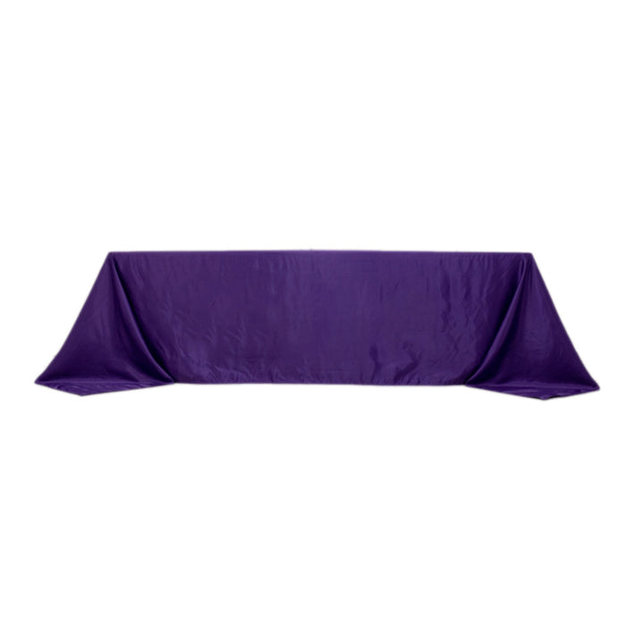 Purple tablecloth draped elegantly on a flat surface