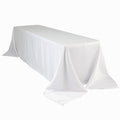 White tablecloth draped over a rectangular table