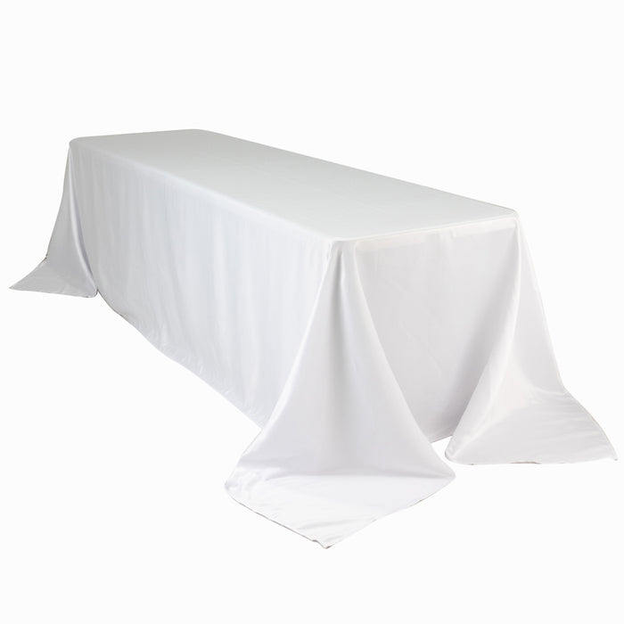 White tablecloth draped over a rectangular table