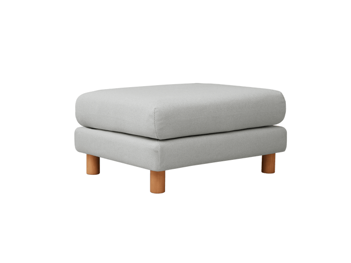 Light grey ottoman with rounded edges, featuring wooden legs. Perfect for modern living room decor.
