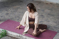 Kosha Yoga Purple Merlot Yoga Mat Teacher sitting on mat in Mysore