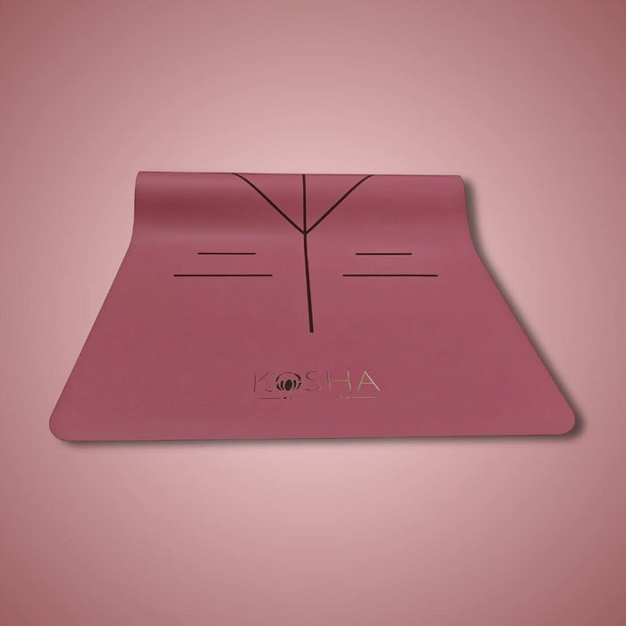 pink yoga mat with alignment lines and natural rubber for extra grip