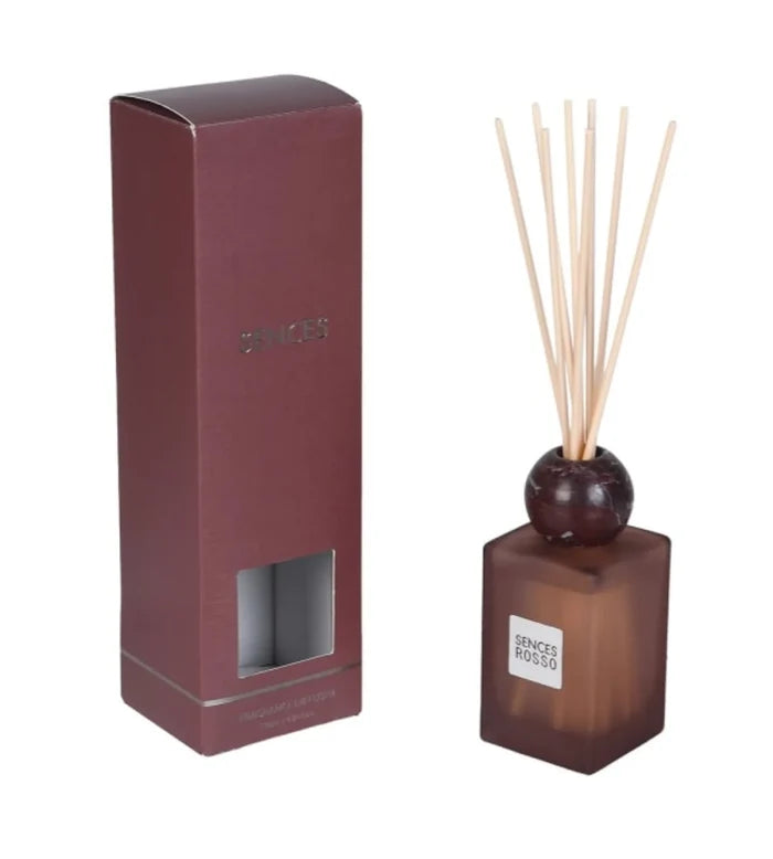Sence's Redwood reed diffuser with a dark brown glass bottle, natural wood reeds, and a matching dark brown box on a white background.