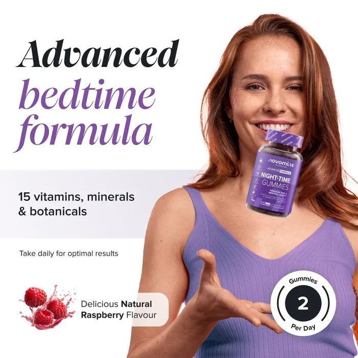 A smiling woman with red hair in a lilac top holds a bottle of Novomins Night-Time Gummies, headed 'Advanced bedtime formula' with 15 vitamins, minerals and botanicals to take daily for optimal results, in a natural raspberry flavour with two gummies per day.