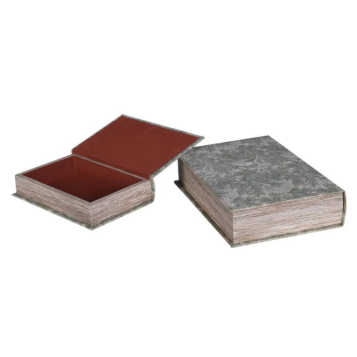 Two books with different cover materials on a white background
