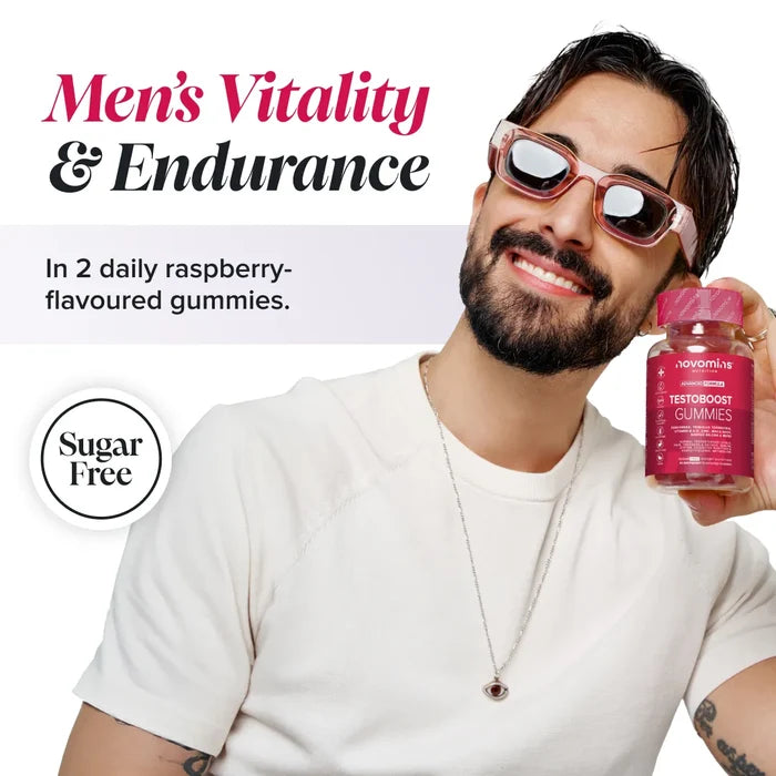 A smiling man with a beard and sunglasses holds a bottle of Novomins TestoBoost Gummies, headed 'Men's Vitality & Endurance in 2 daily raspberry-flavoured gummies', with a sugar free badge.