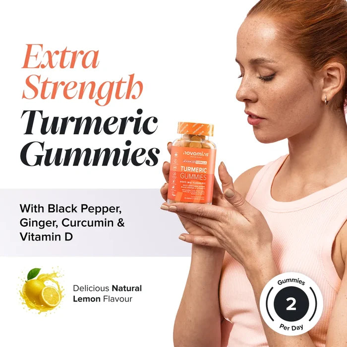 A woman with red hair in a pink vest holds a bottle of Novomins Turmeric Gummies, headed 'Extra Strength Turmeric Gummies' with black pepper, ginger, curcumin and vitamin D, in a natural lemon flavour with two gummies per day.