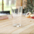 Wings Of Glory: WW1 Pint Glass 16oz with a clear design on a wooden table