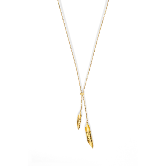 Gold necklace with pendant on a white background